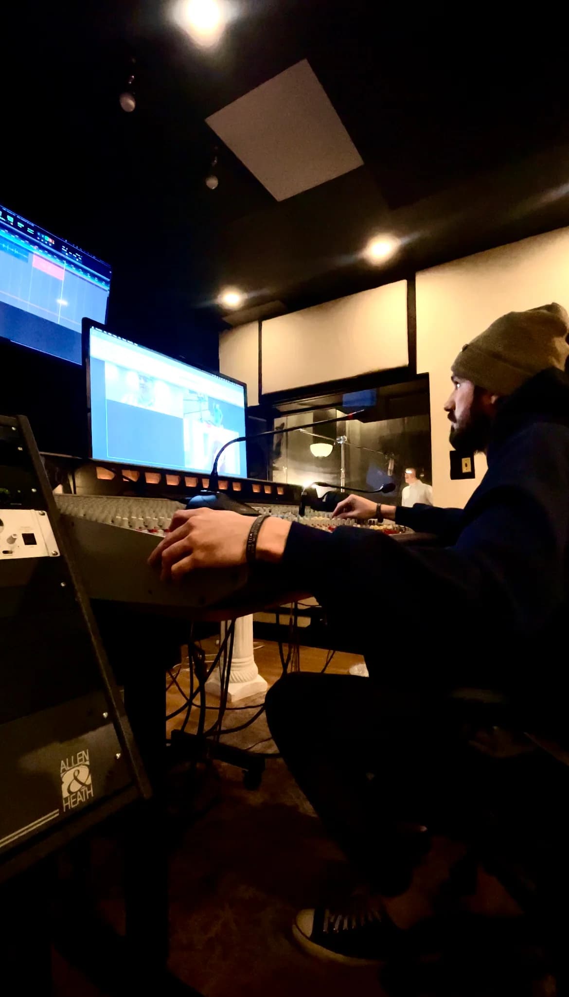 A recording session at the studio console
