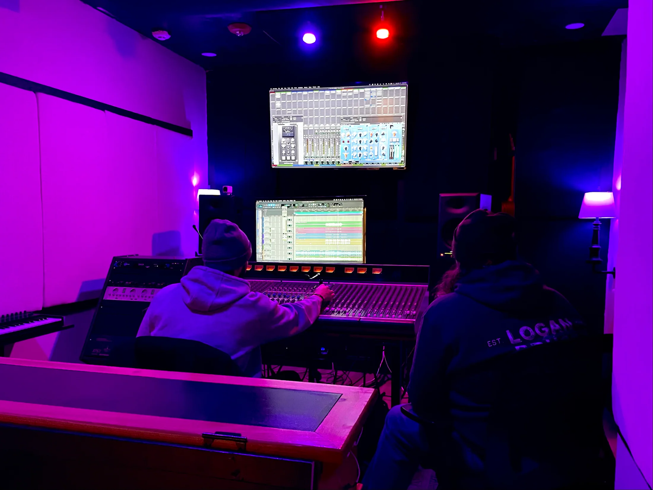 Dirk Androff reflected in an analog mixing console